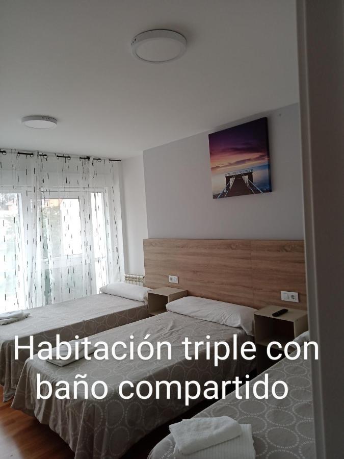 Habitación Triple Básica con baño compartido