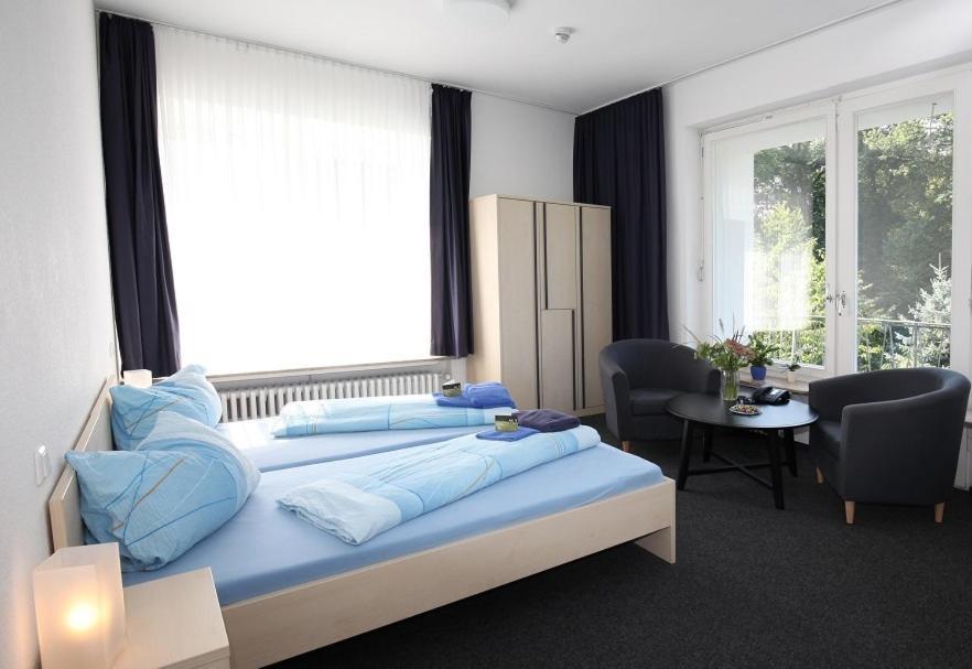 Zweibettzimmer mit Dusche