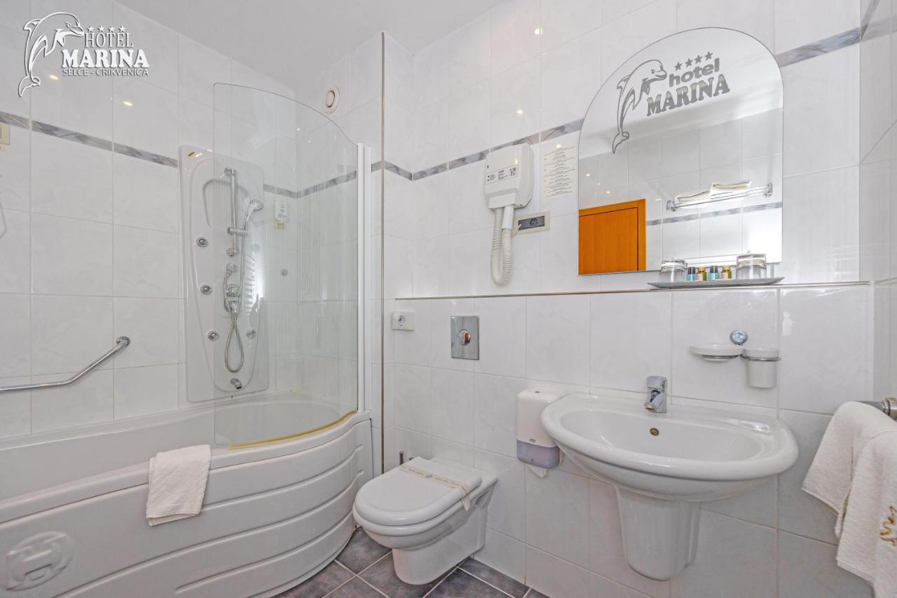 Double or Twin Room with Balcony and Side Sea View