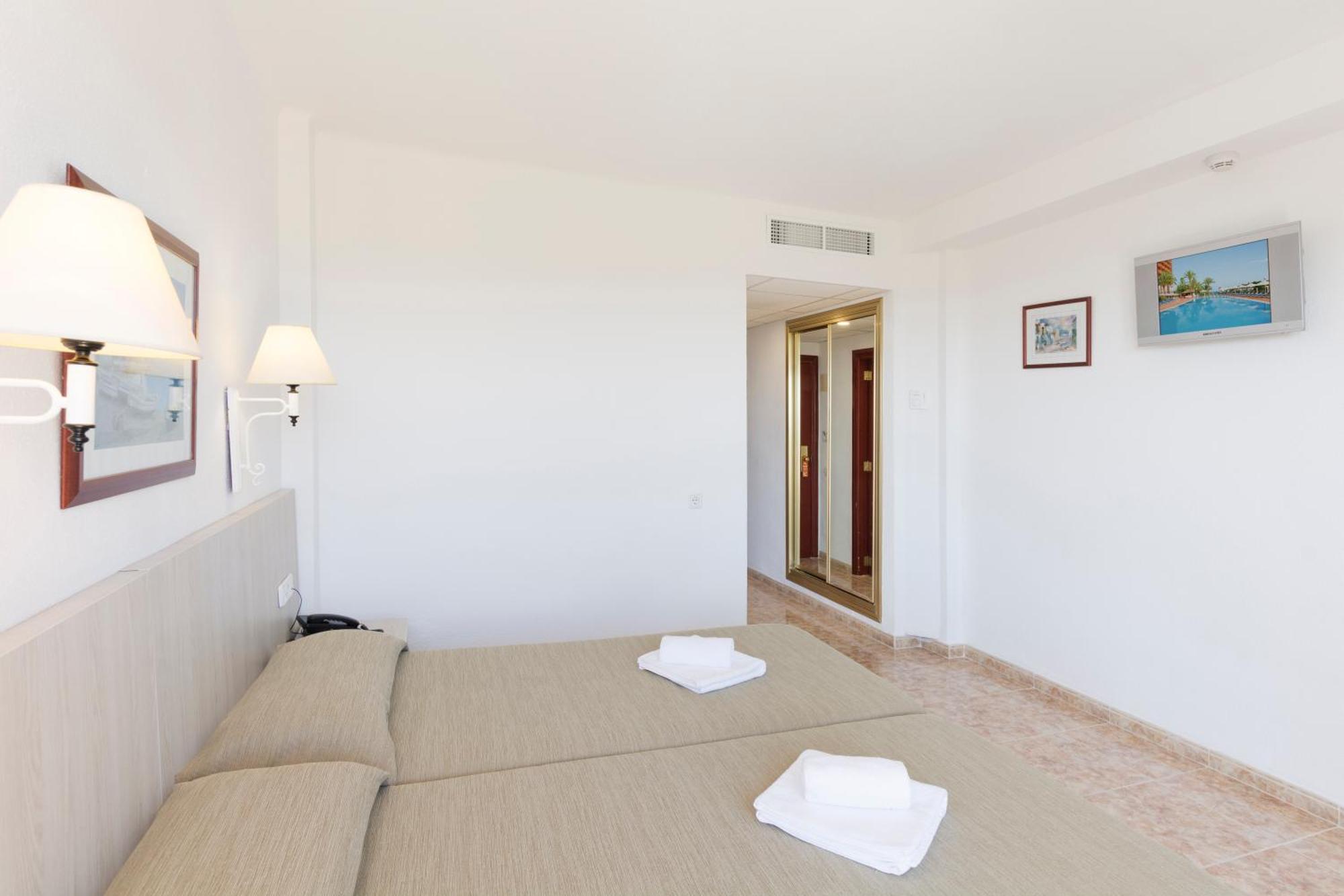 Chambre Double (2 Adultes + 2 Enfants)