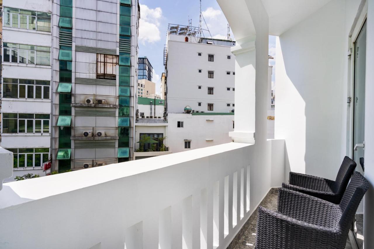 Family Room with Balcony and City View