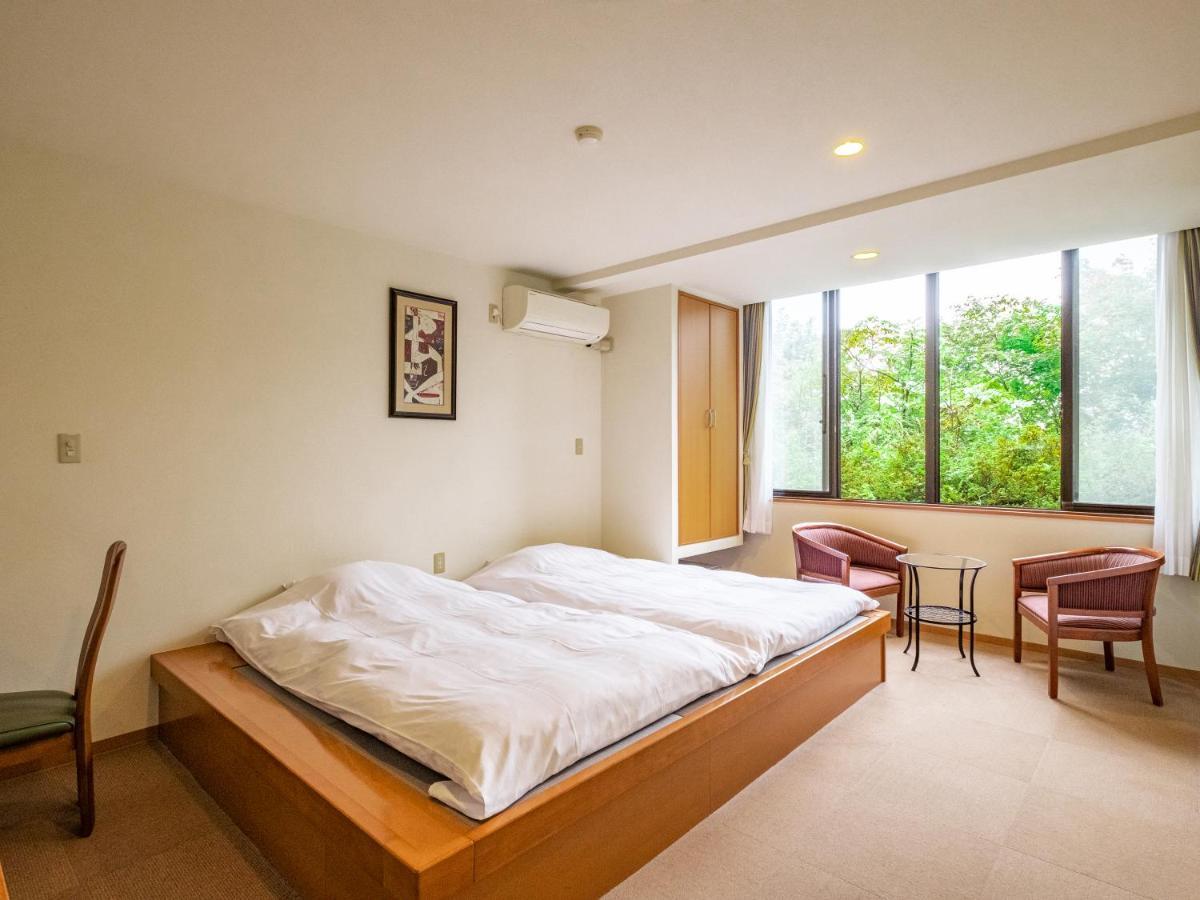 Limited to 1 Room - Twin Room with Private bath outside the room (※50-minute slot/※Not a hot spring)　