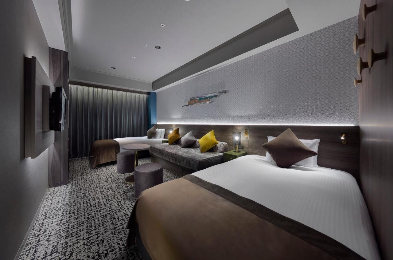 Chambre Lits Jumeaux (30 m2) avec Cabine de Douche et Canapé-Lit pour 3 Personnes - Non-Fumeurs