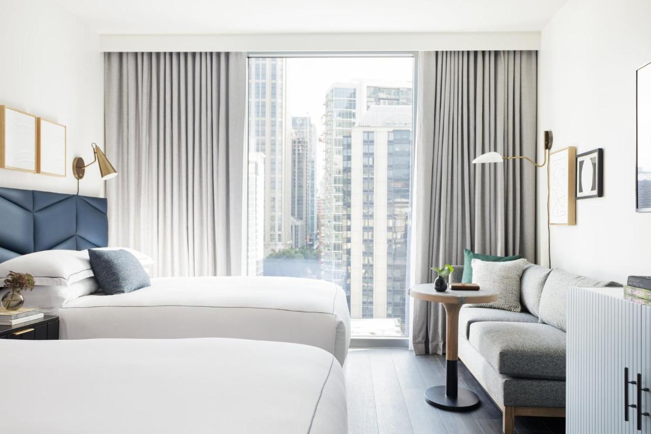 Habitación Doble Premium con 2 camas grandes y vistas a la ciudad