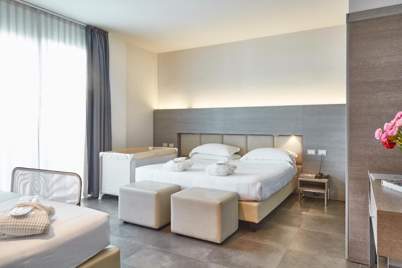 Superior Triple Room with Side Sea View