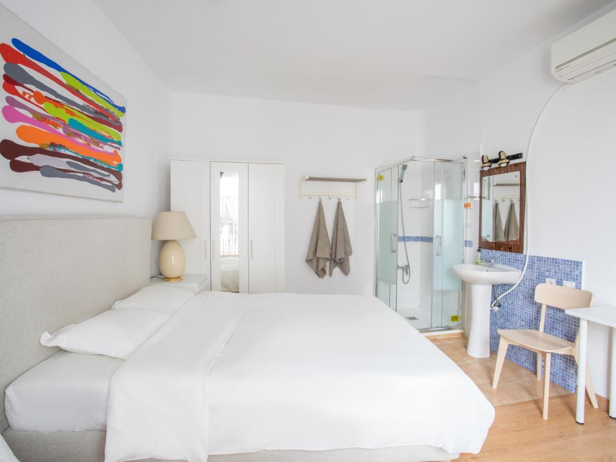 Quadruple Room with Private Shower and Shared Toilet