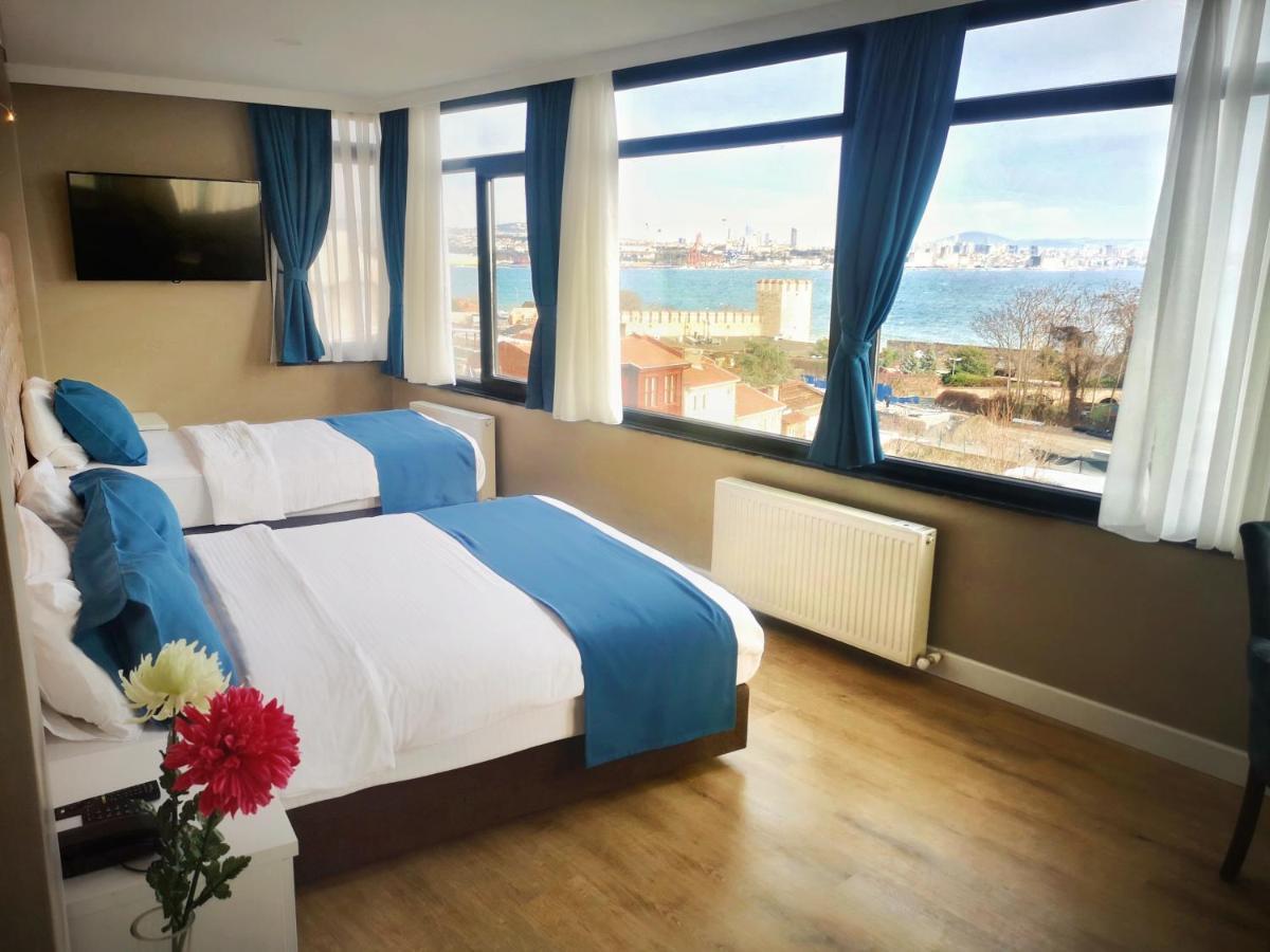 Deluxe Driepersoonskamer met Uitzicht op Zee
