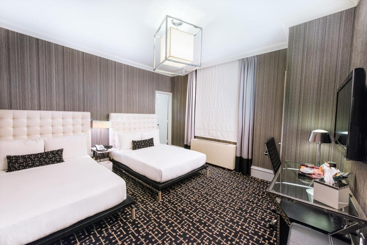 Quarto Duplo Deluxe com 2 Camas de Casal