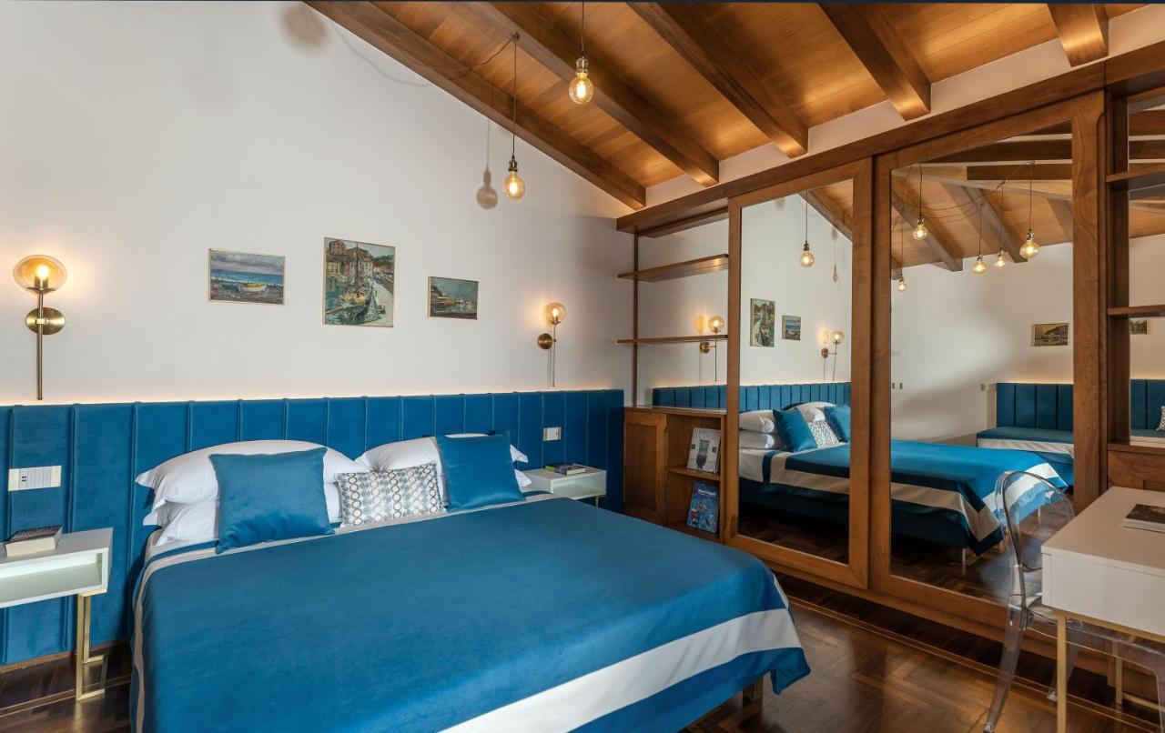 Deluxe tweepersoonskamer met balkon en uitzicht op zee
