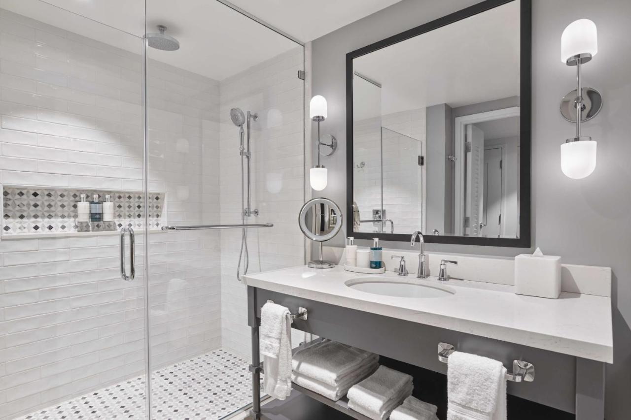 Two Queen Beds with Partial Ocean View and Accessible Shower