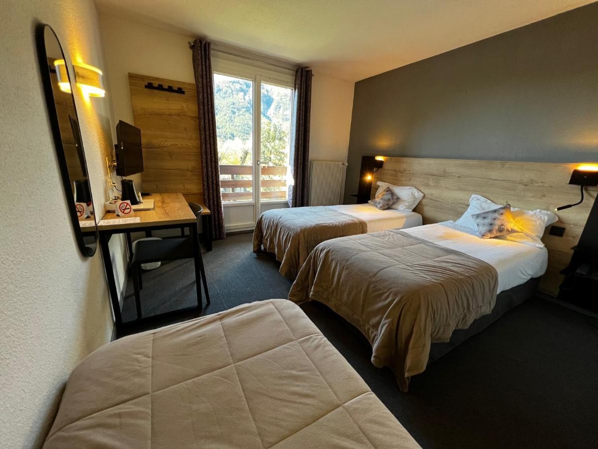 Superior Triple Room with Balcony Garden View