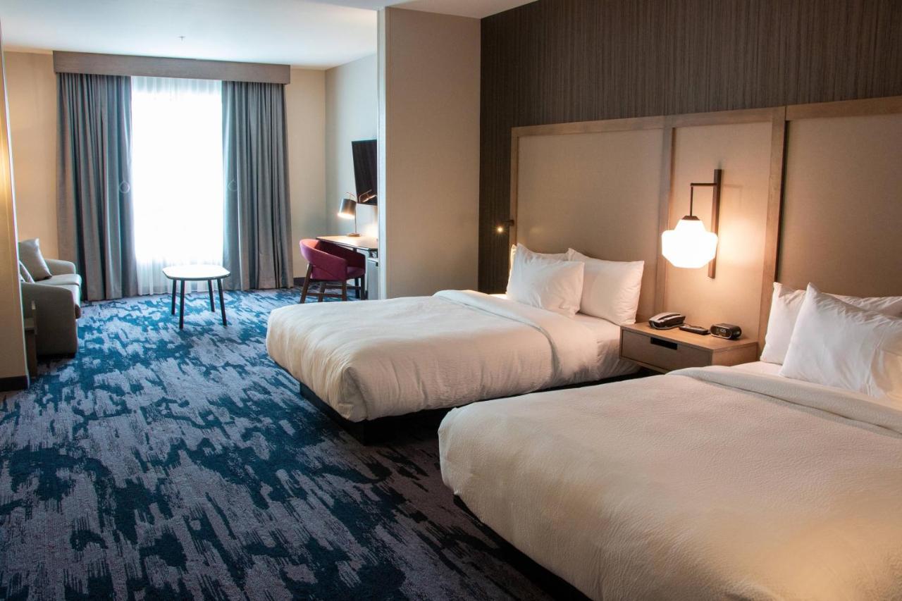 Queen Suite with Two Queen Beds, Roll-In Shower and Sofa Bed - Mobility Access