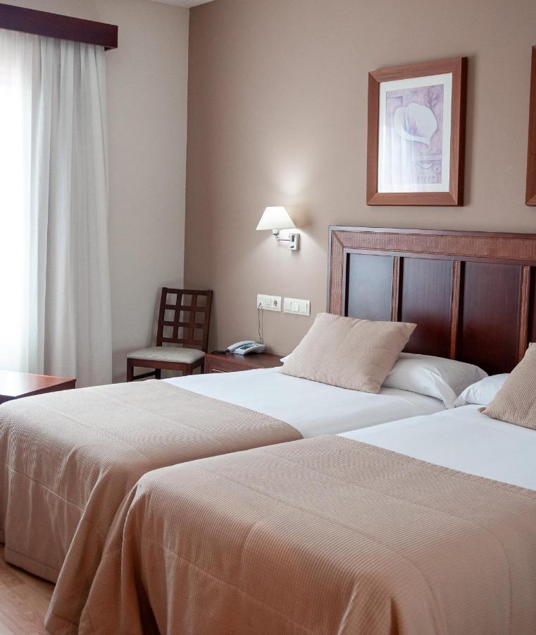 Two Beds Double Room