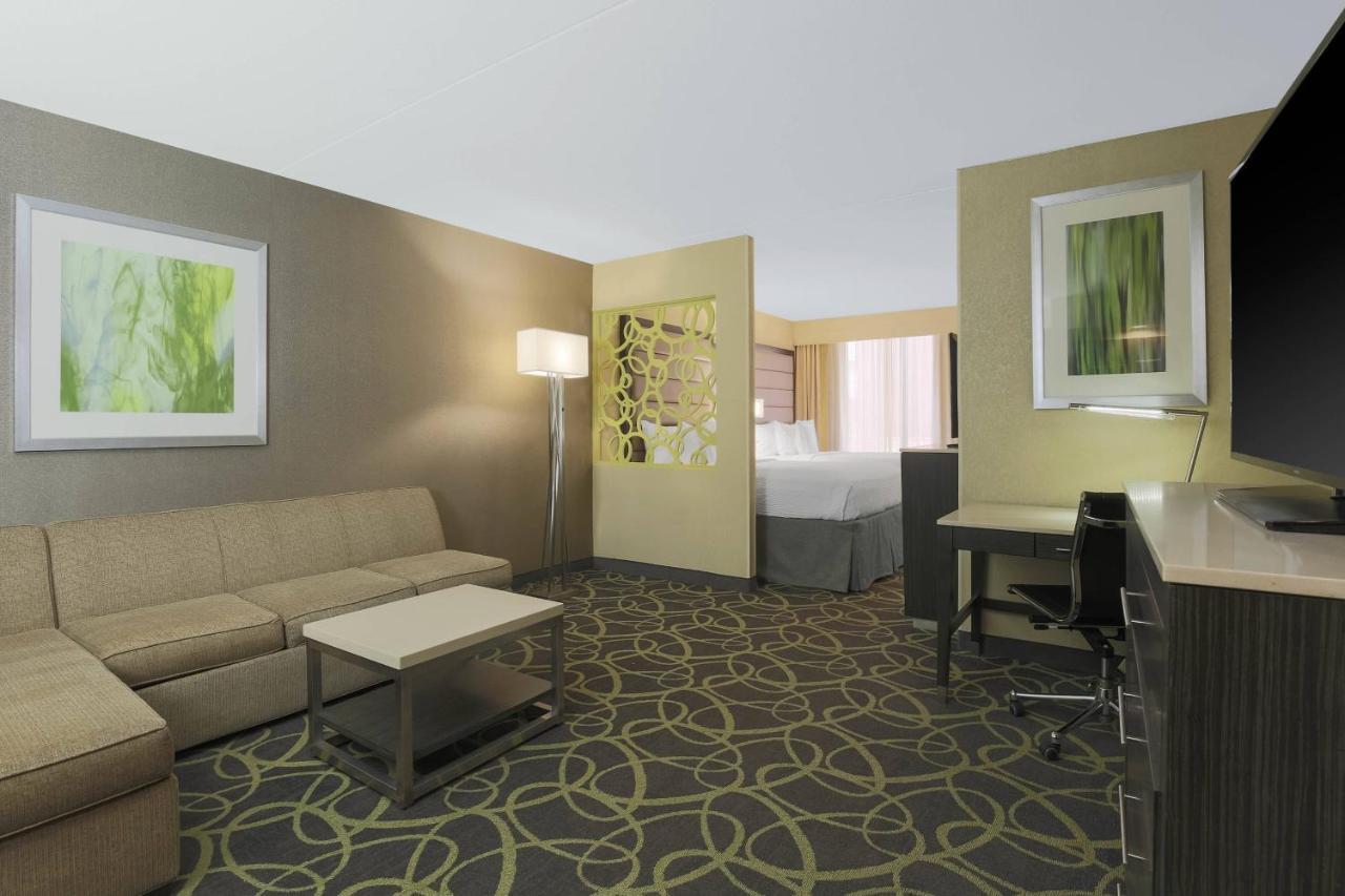 Large Executive Suite with Two Double Beds and Sofa Bed