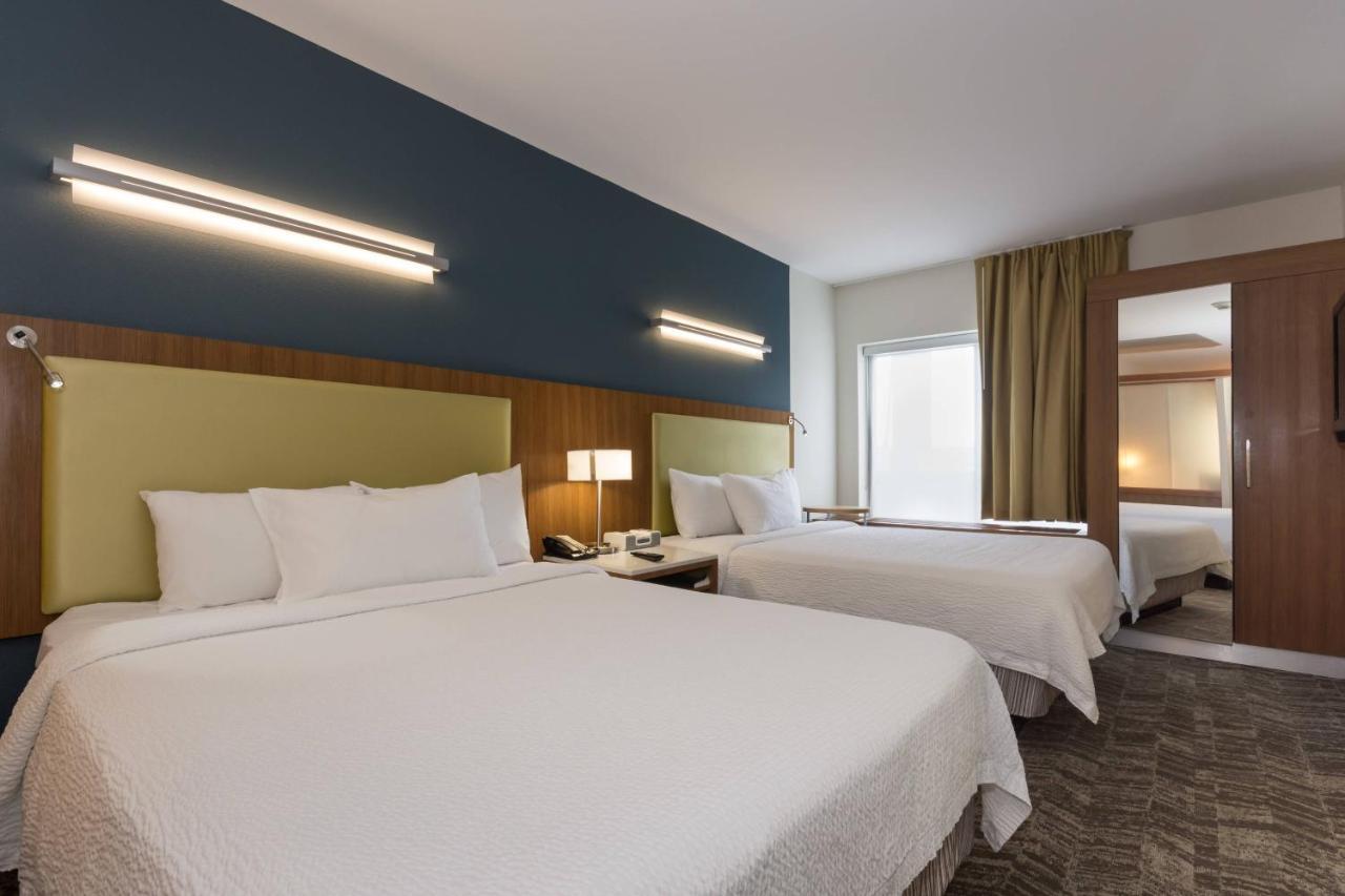 Queen Suite with Two Queen Beds and Sofa Bed