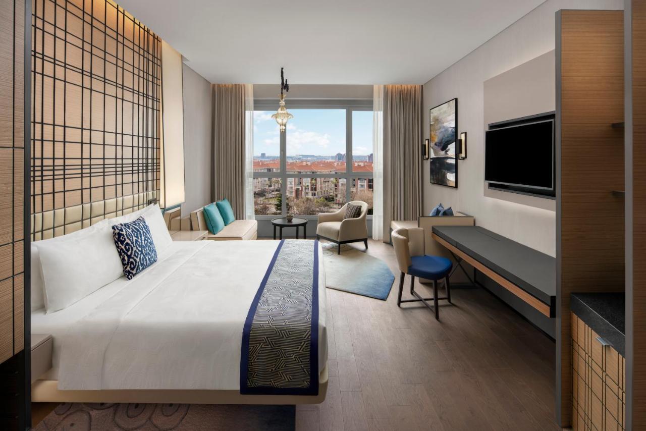 Habitación Doble Deluxe con cama extragrande y vistas a la ciudad