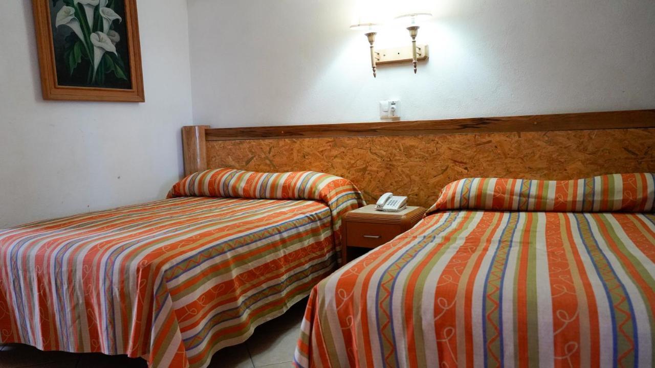 Quarto com Cama de Casal ou 2 de Solteiro