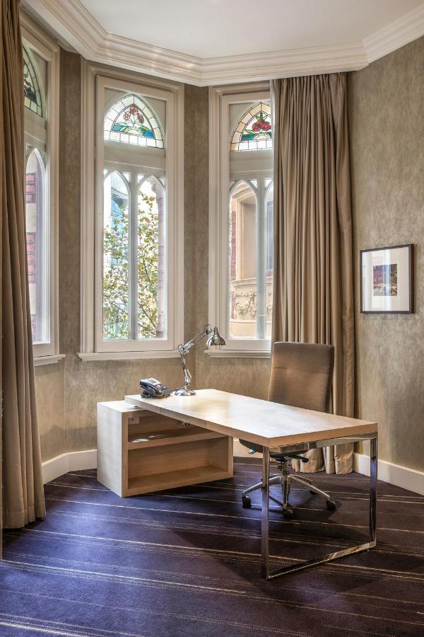 Suite Junior con cama extragrande - Collins St.