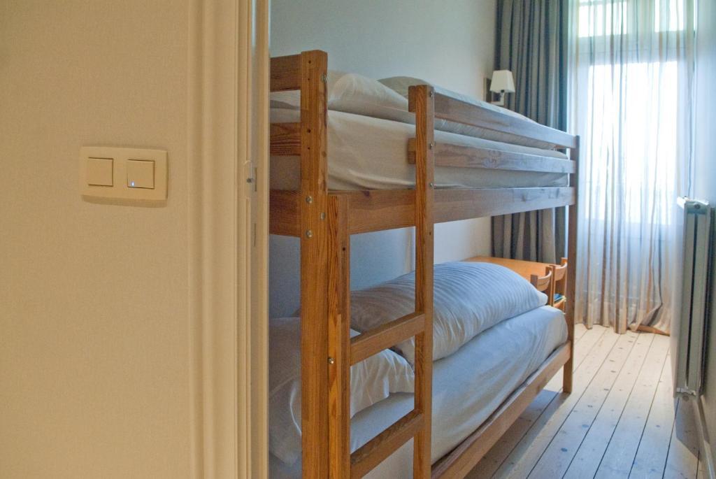 Quadruple Room (2 Adults + 2 Children)