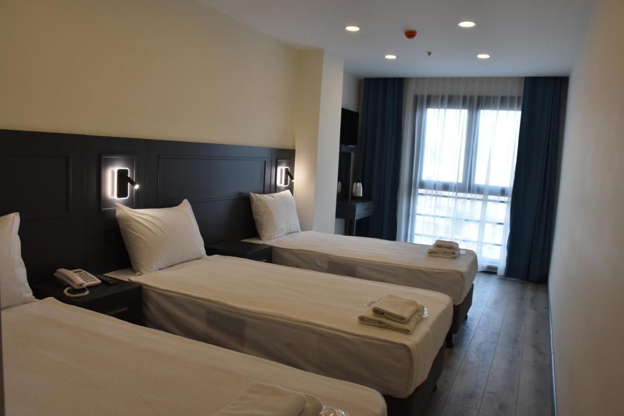 Deluxe Triple Room,1407866792:JPEG