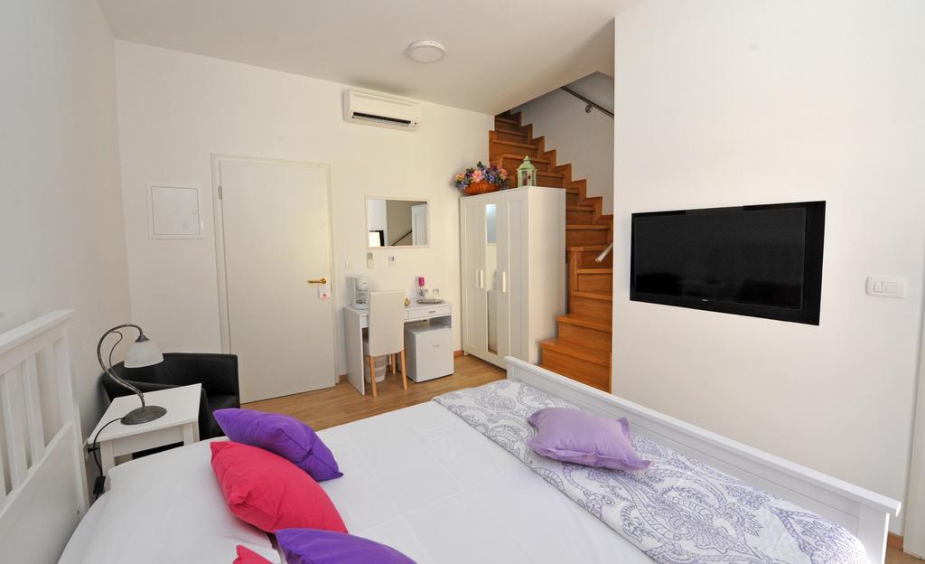 Quadruple Room with Balcony