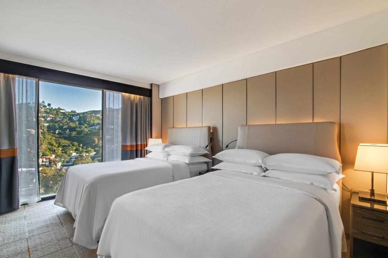 Chambre Double Traditionnelle avec 2 Lits Doubles