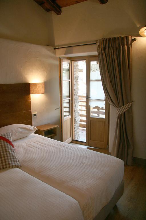 Large Quadruple Room with Balcony