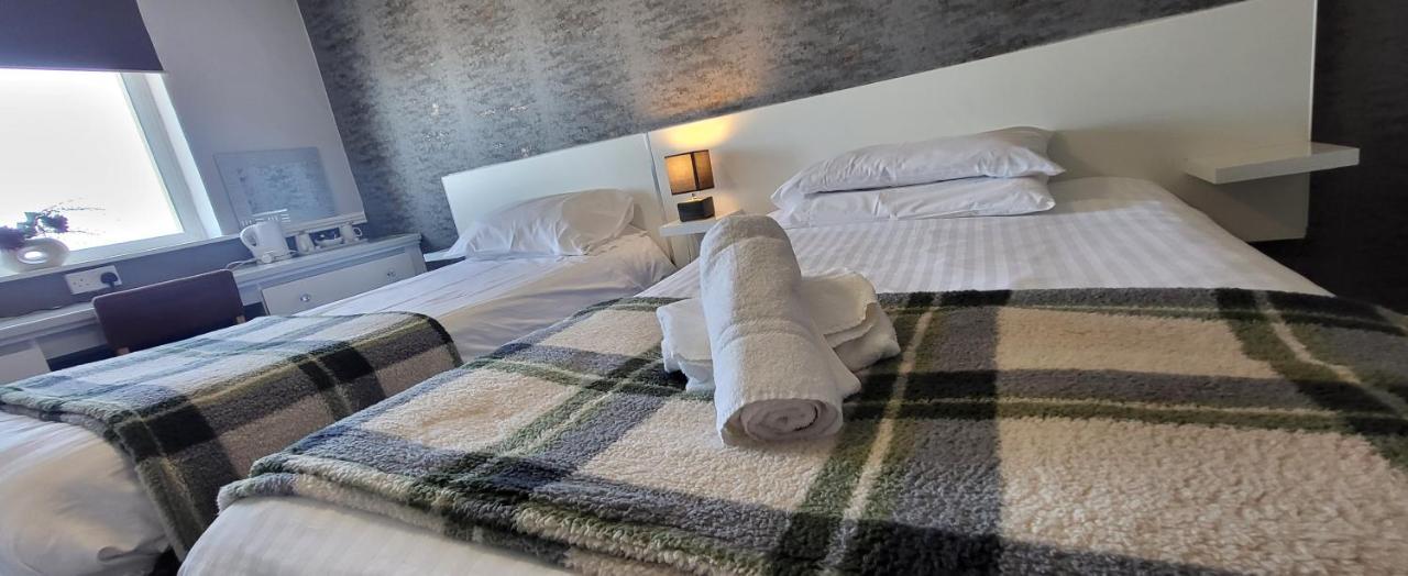Quarto com 2 Camas de Solteiro e Vista do Mar