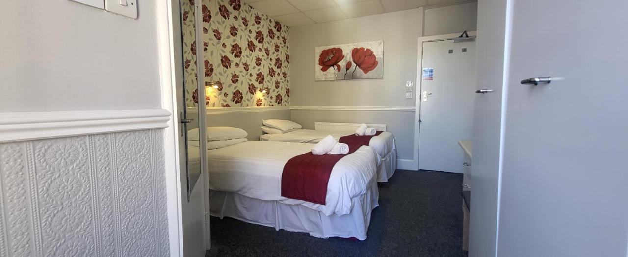 Quarto com 2 Camas de Solteiro