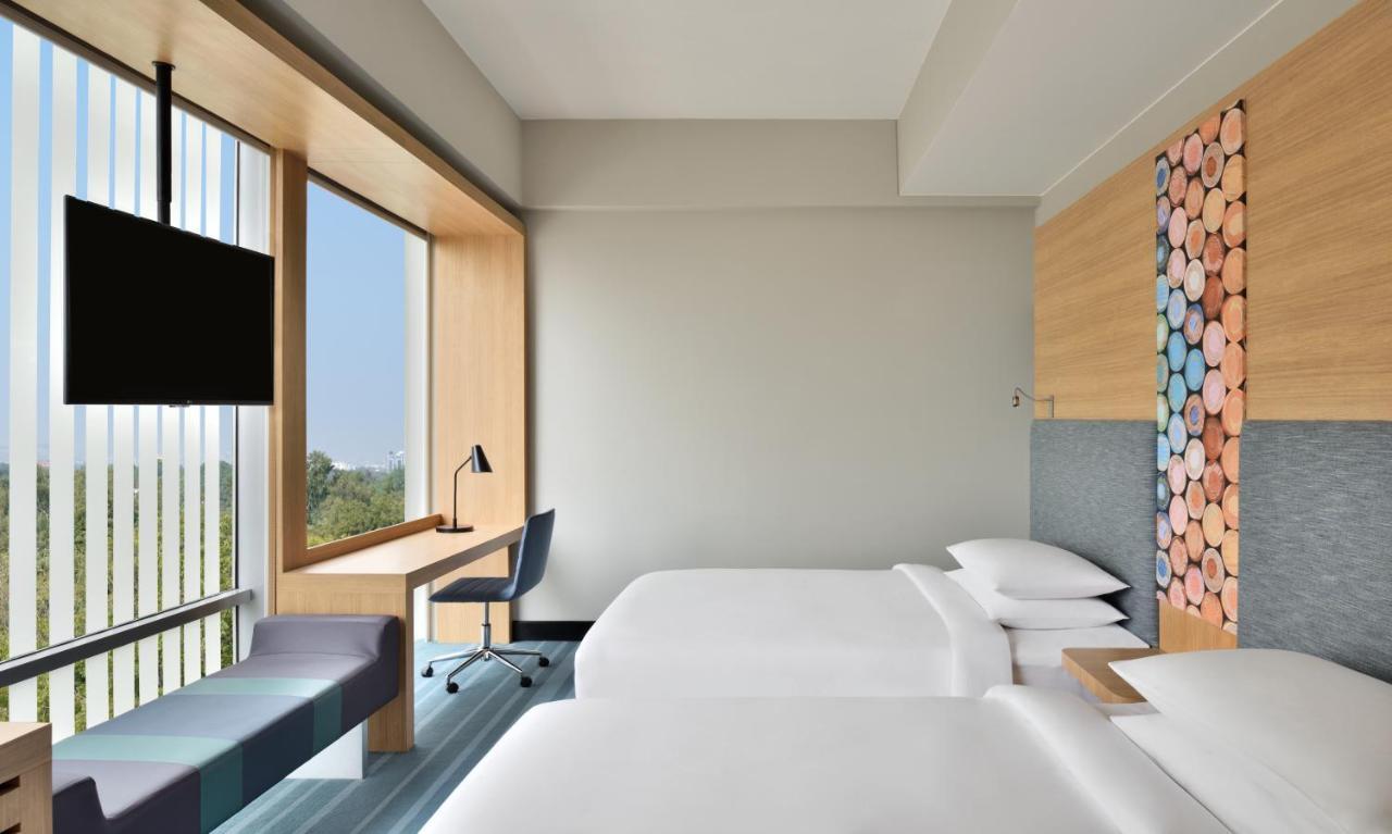 2 Twin/Single Beds, City View, Aloft Room:  20% discount on F&B and SPA
