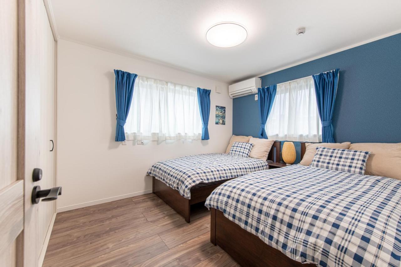 Chambre Lits Jumeaux avec Salle de Bains Commune
