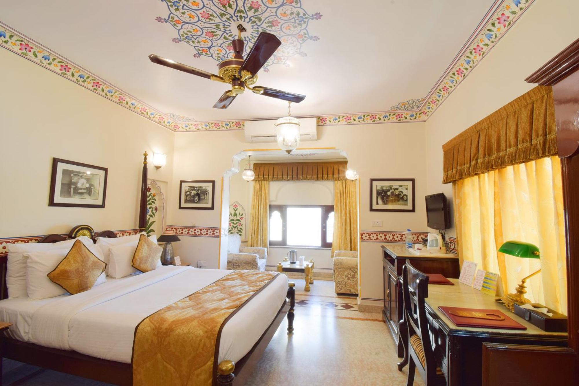 Royal Deluxe Family pickup on arrival from train or bus station Enjoy a daily Rajasthani dance & music show from 7–9 PM swimming pool a dedicated travel desk to assist local sightseeing tours intercity travel arrangements & activit,1440239695:JPEG
