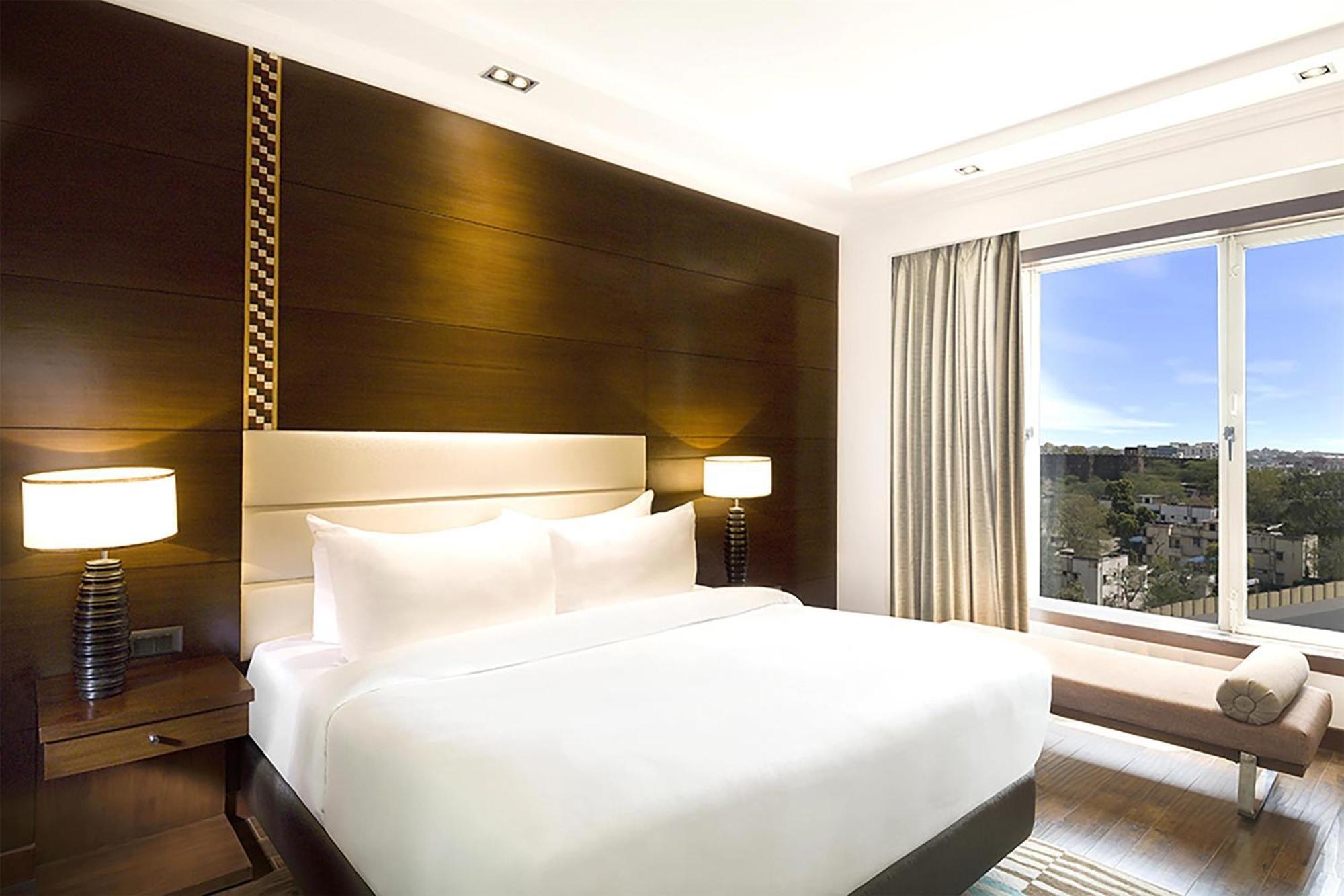 Junior Suite 2 Way Airport Transfer on SPA laundry INR 500 F&B credit Fruit basket on the of arrival 4 pcs of Laundry or room or One bottle of whiskey or as per availability 2 pints of House Beer once during,1277907235:JPEG