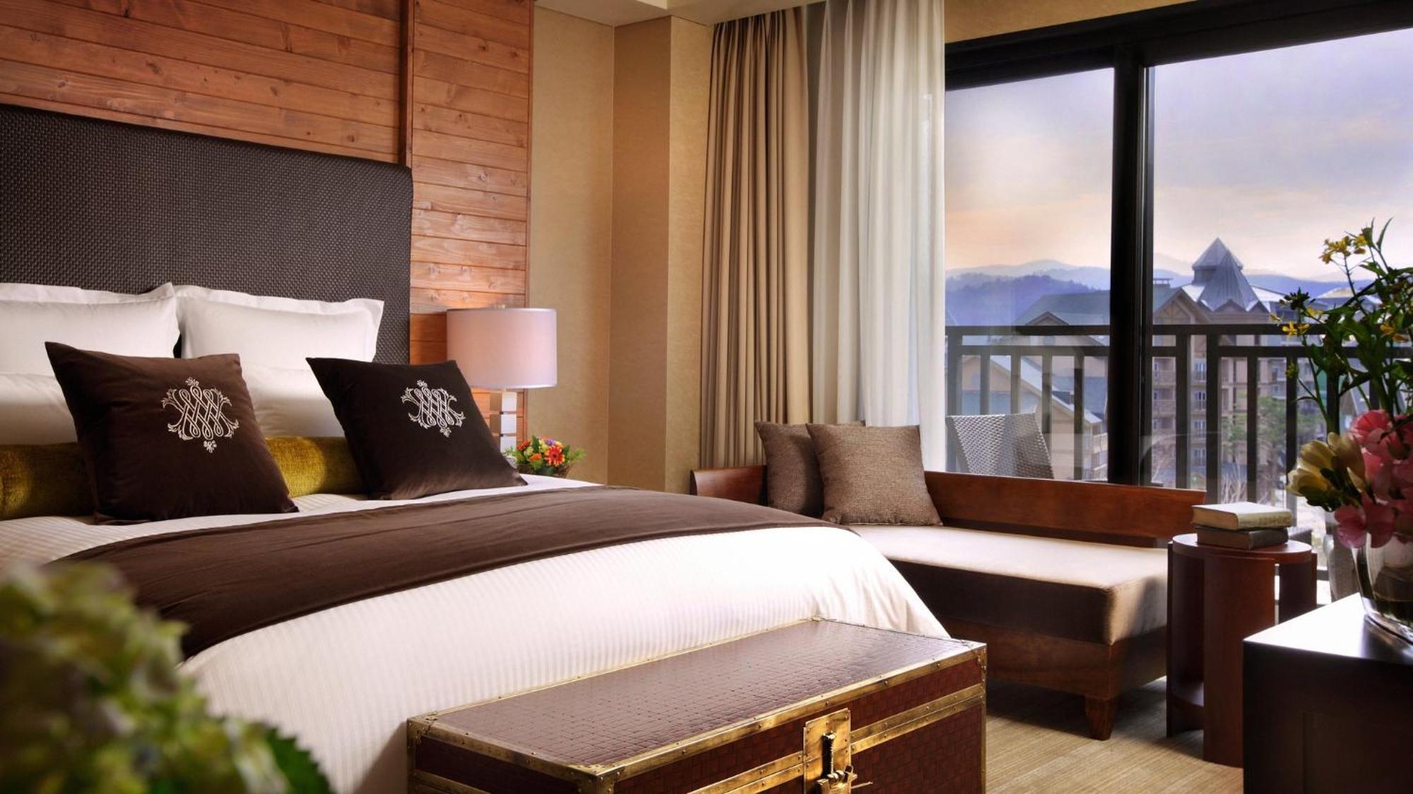 Two-Bedroom Suite with One King Bed and Two Single Beds