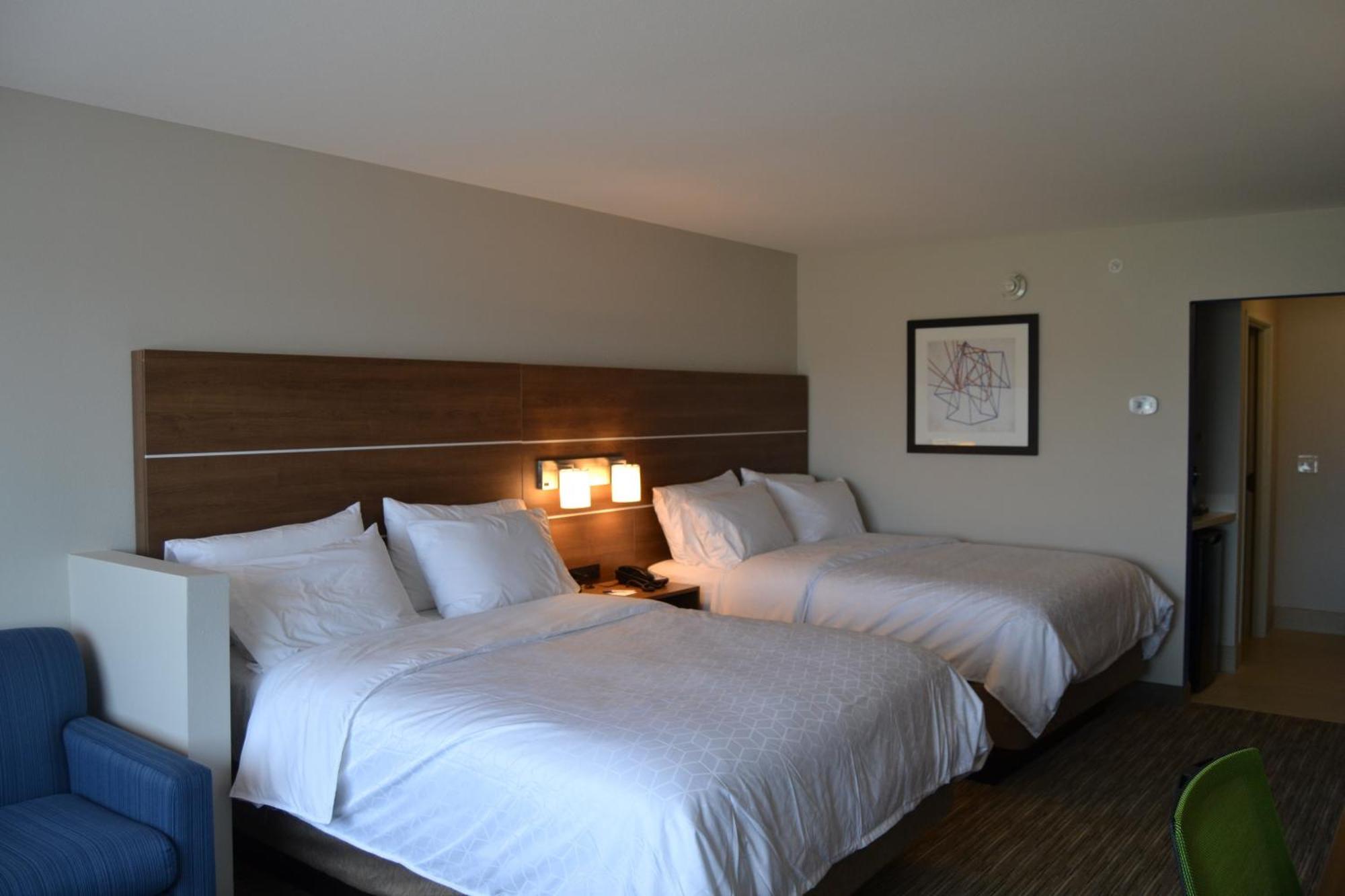 Queen Suite with Two Queen Beds and Sofa Bed
