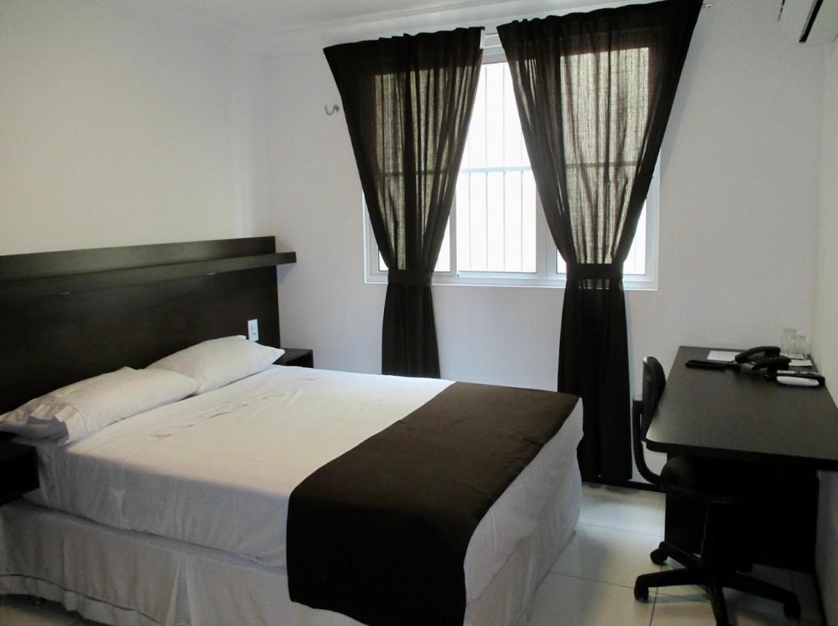 Quarto Triplo Executivo