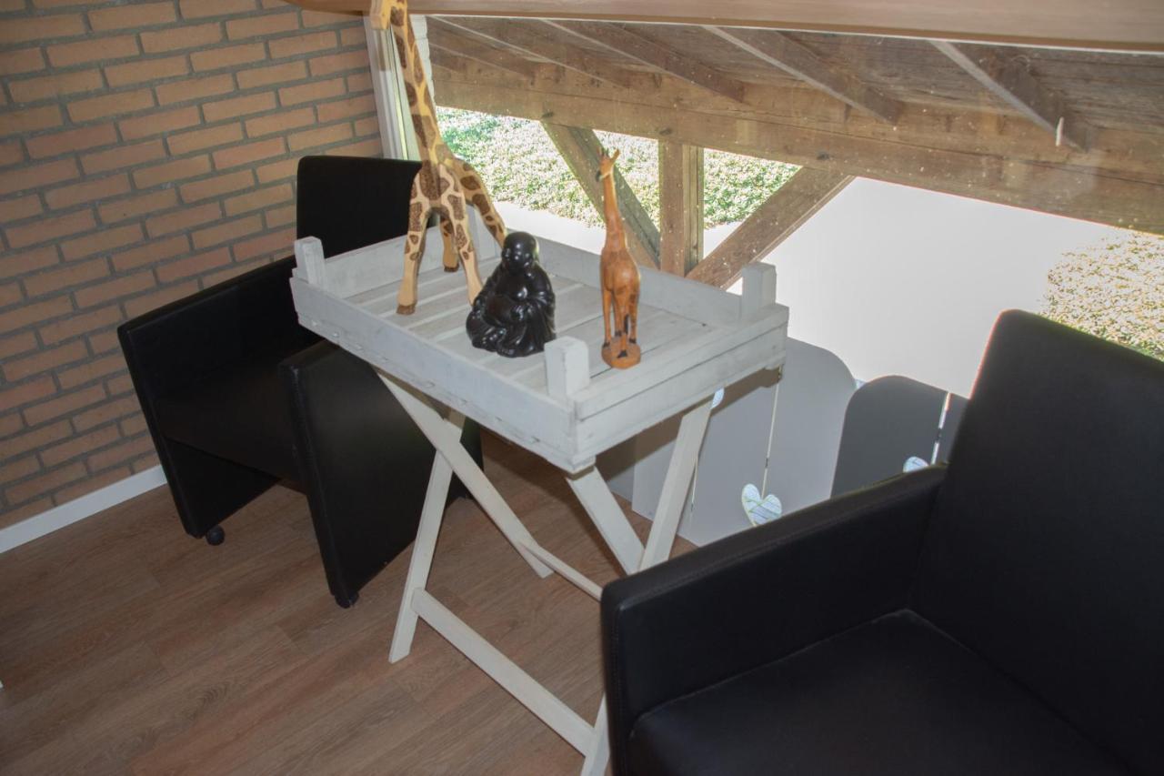 Vierpersoonskamer met Uitzicht op de Tuin.