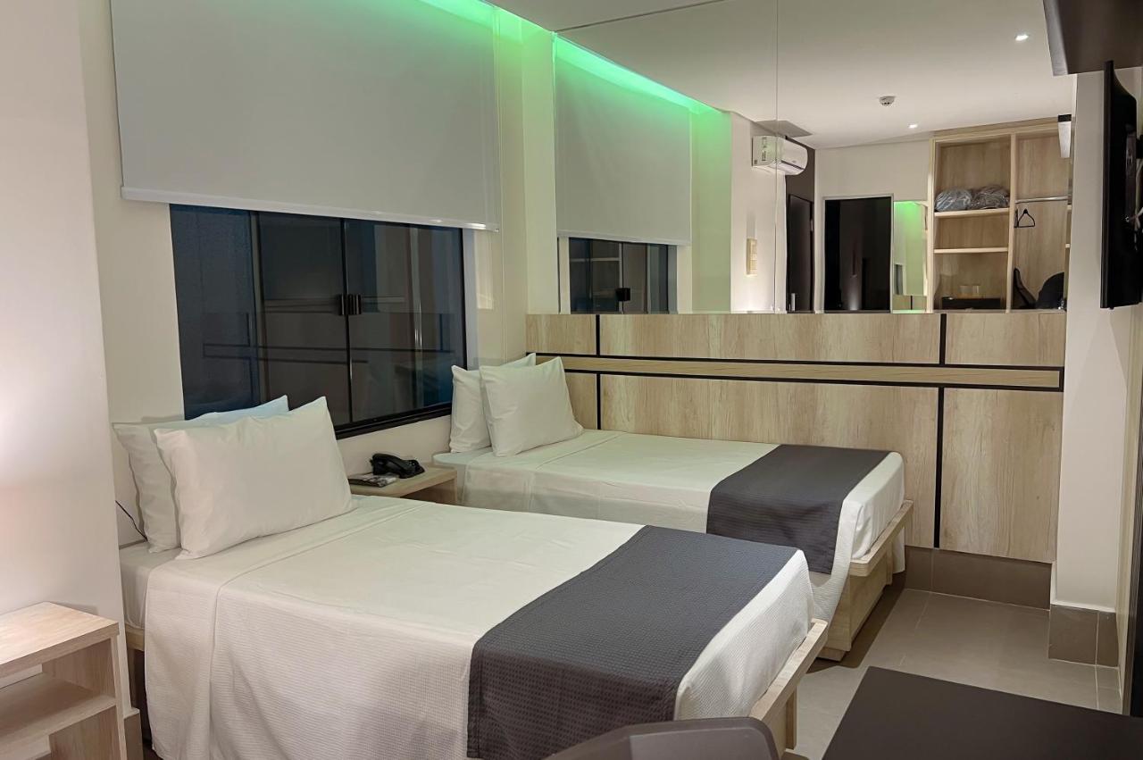 Quarto Standard com 2 Camas de Solteiro e Banheiro Compartilhado