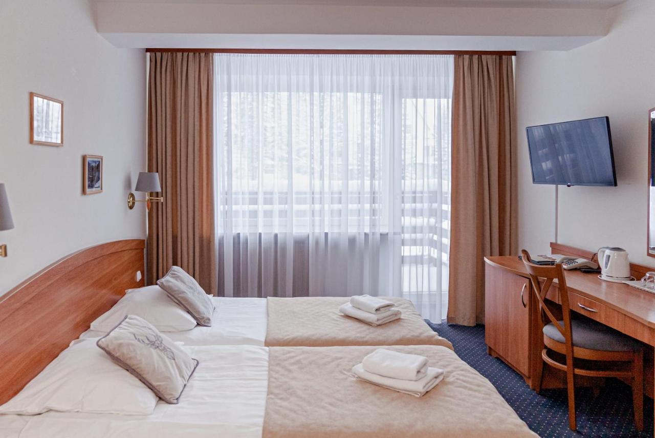 Tweepersoonskamer met 2 Aparte Bedden en Balkon