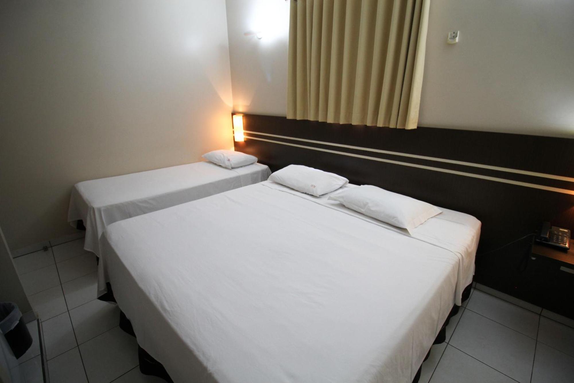 Quarto Triplo Luxo