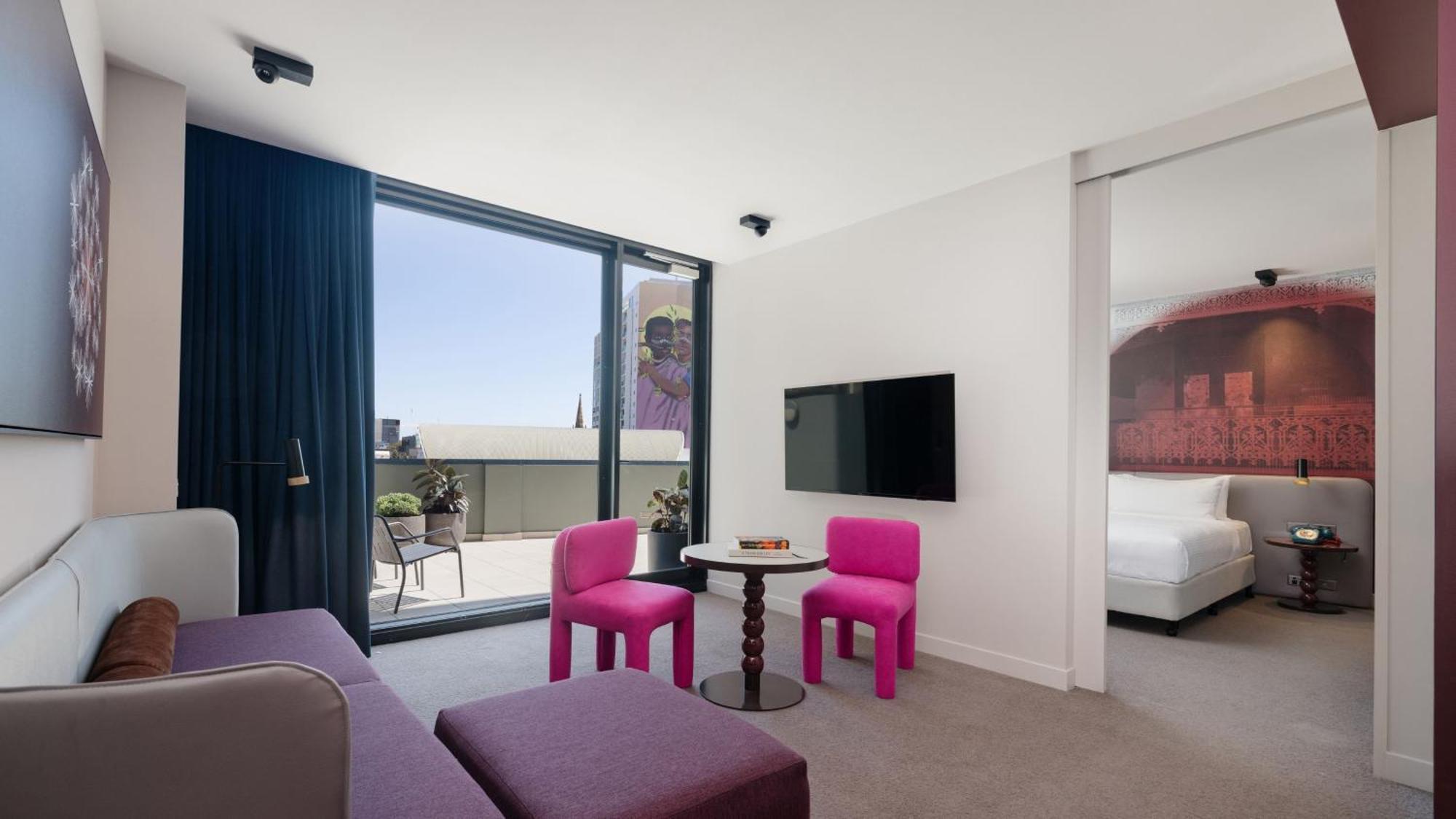 One-Bedroom Suite with City Skyline View and Terrace Access