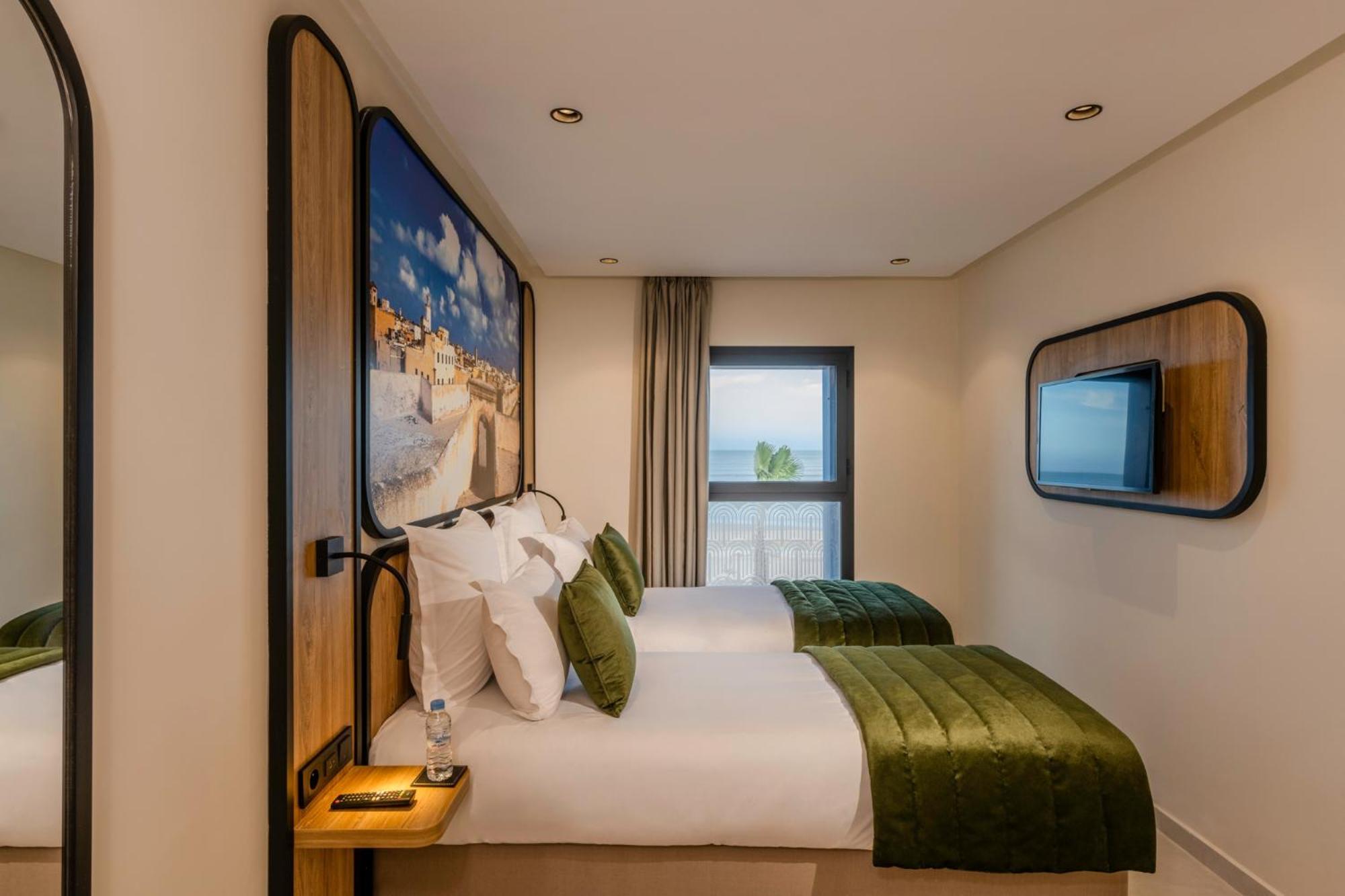 Kamer met Kingsize Bed en Uitzicht op Zee
