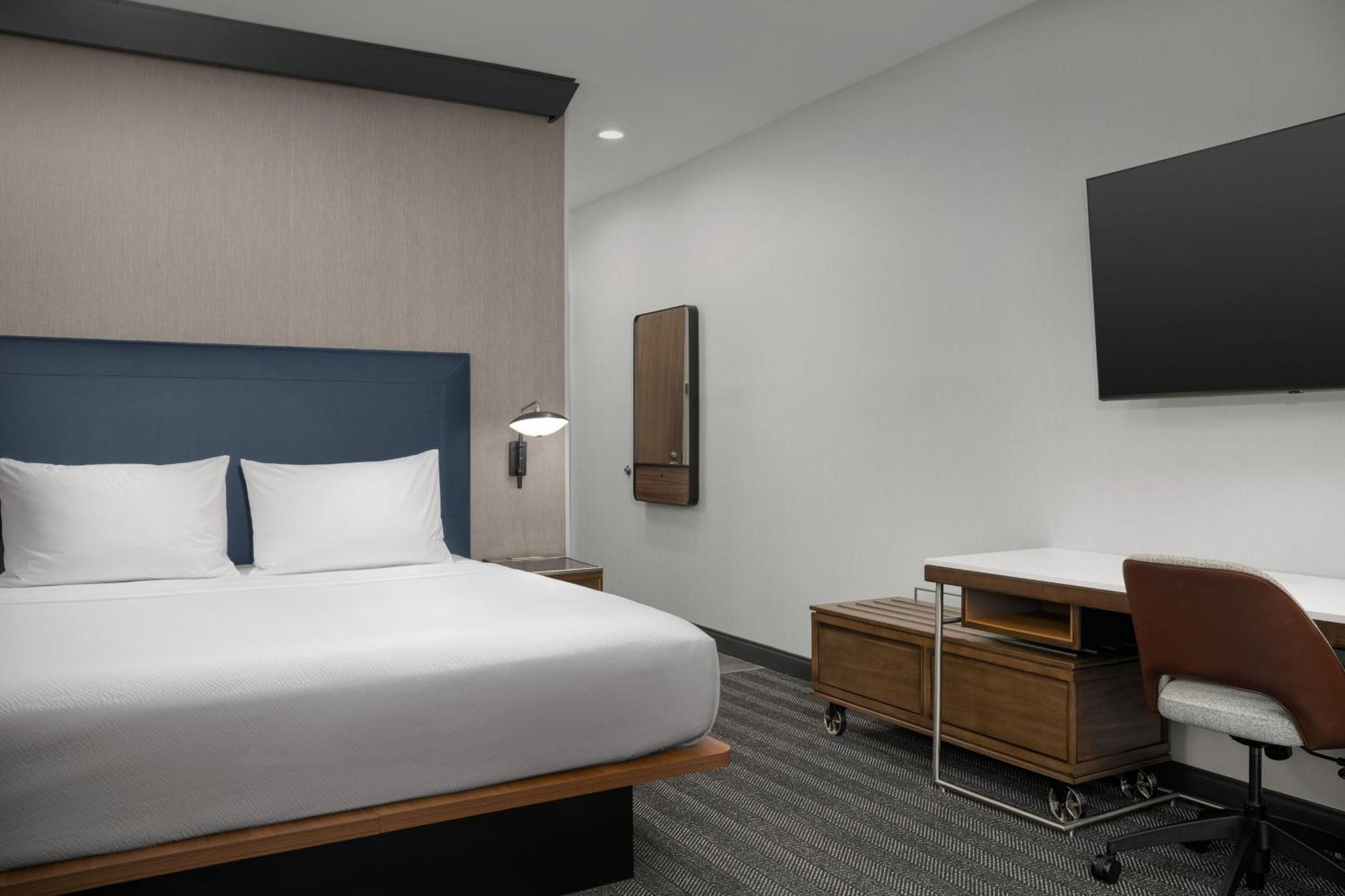 King Room with Roll-In Shower and Sofa Bed - Mobility Access