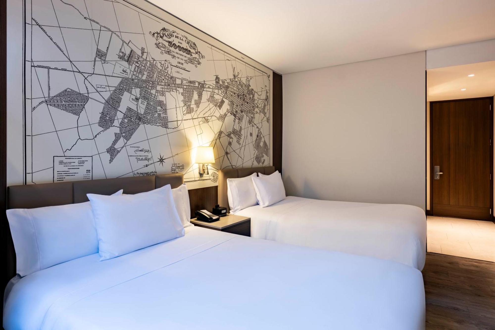 Quarto Twin Superior com 2 Camas de Solteiro