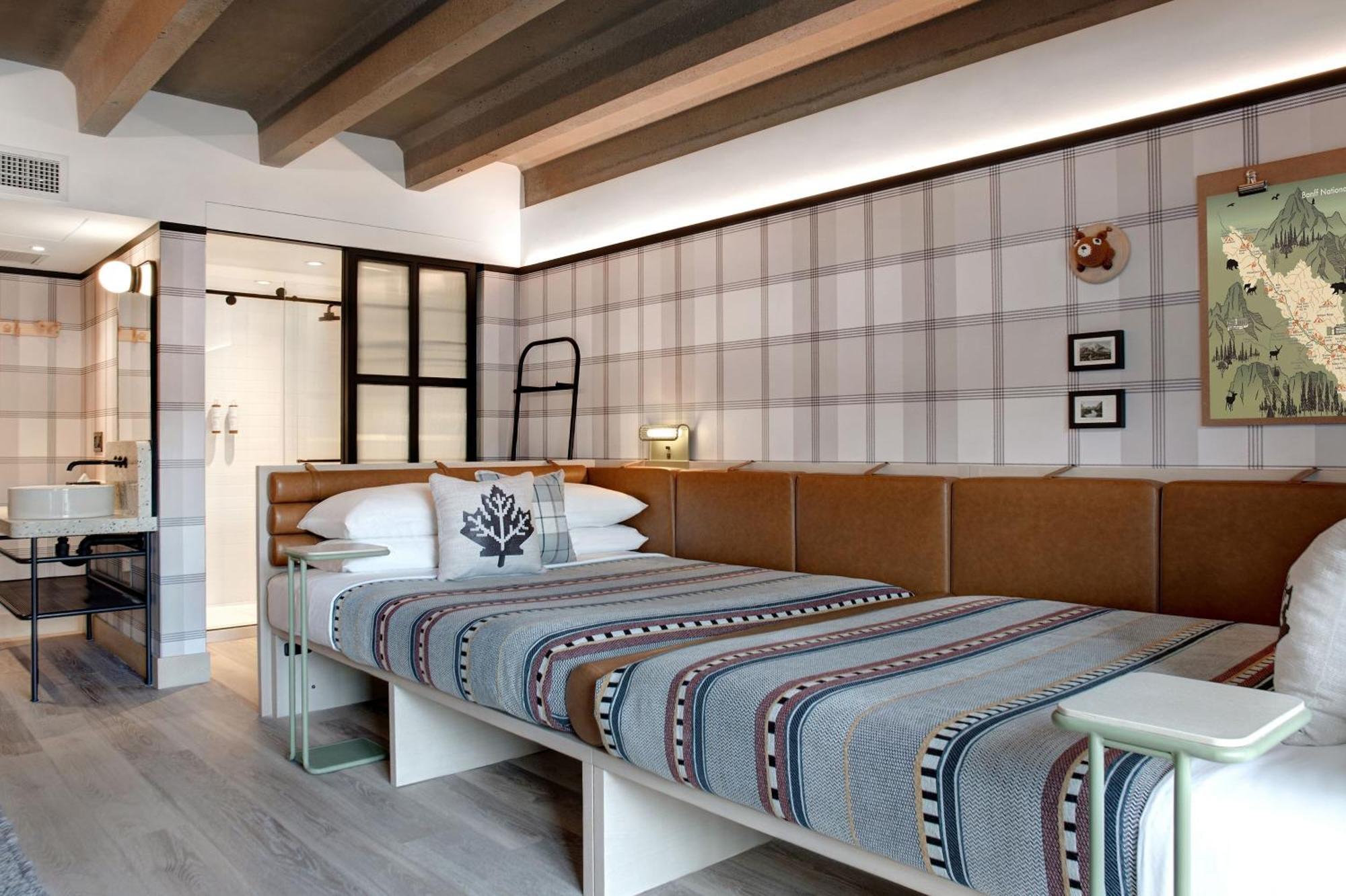 Corner Queen Room with Two Queen Beds and Balcony