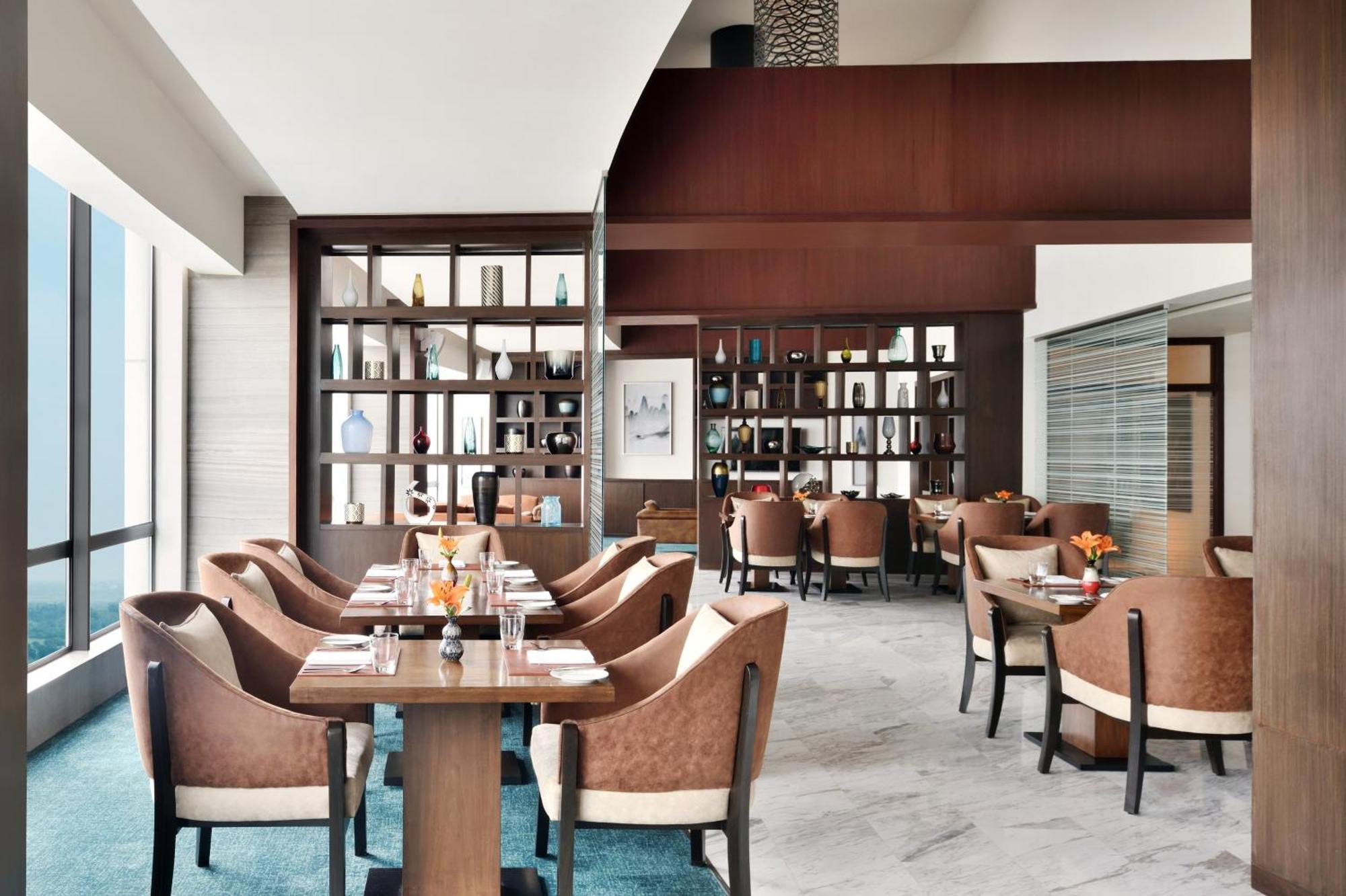 Lake View Suite with Lounge Access, 20% F&B Discount, Happy Hours (1 + 1 IMFL - 4 pm to 8 pm at 31/32) & 2 Way Airport Transfers