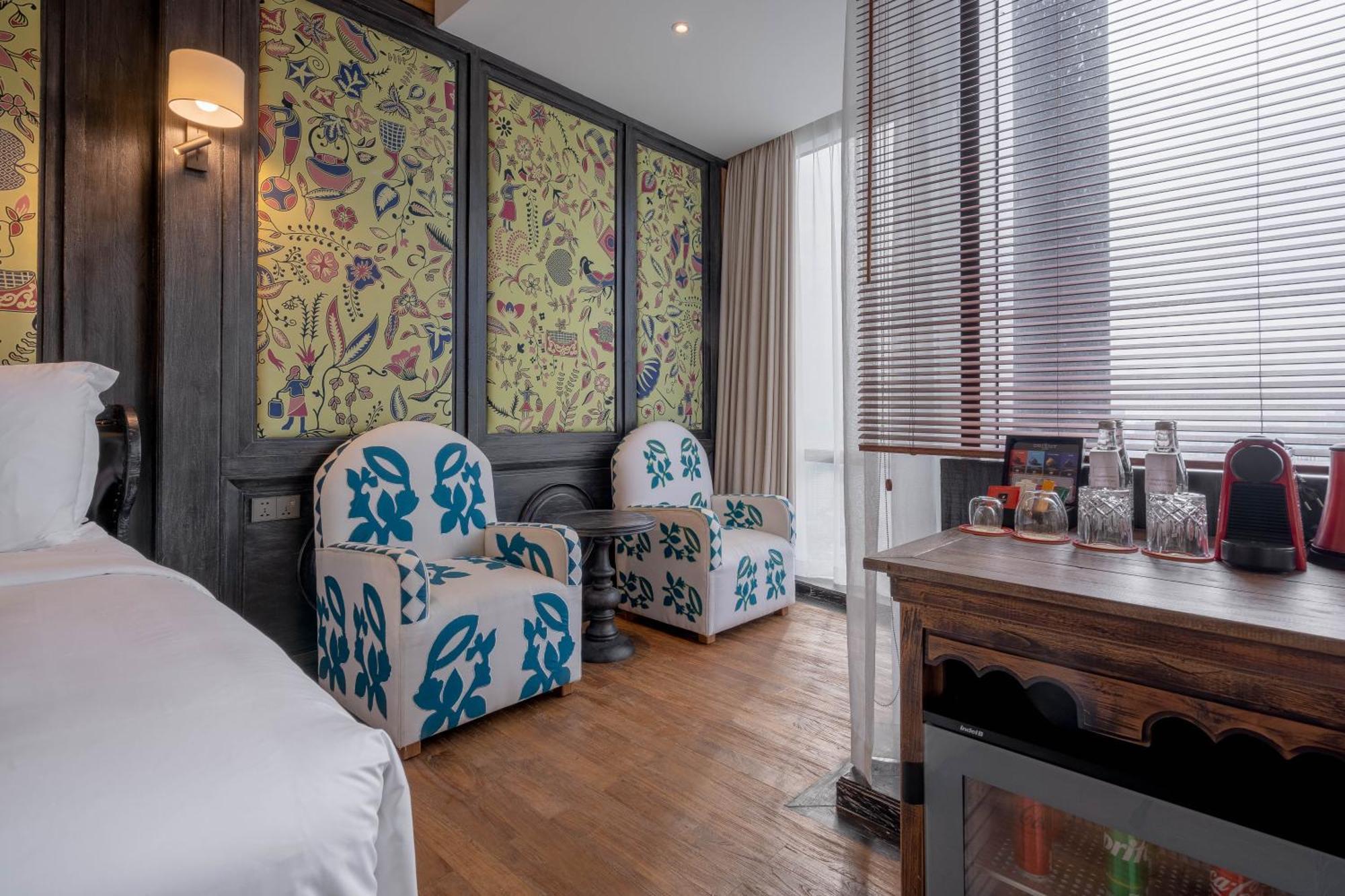 Deluxe Kamer - kingsize bed of twee aparte bedden
