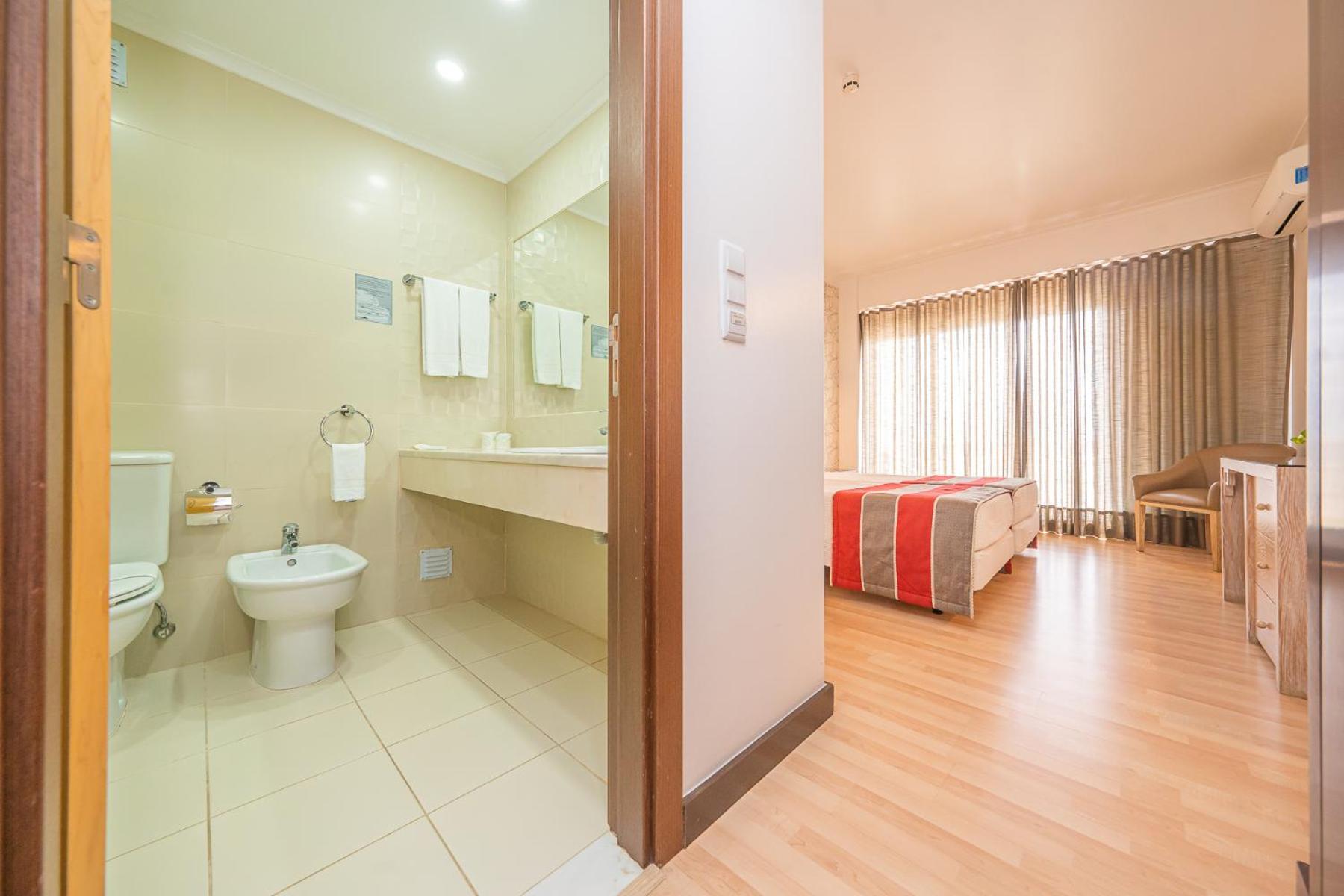 Double or Twin Room with Extra Bed (2 Adults + 1 Child)