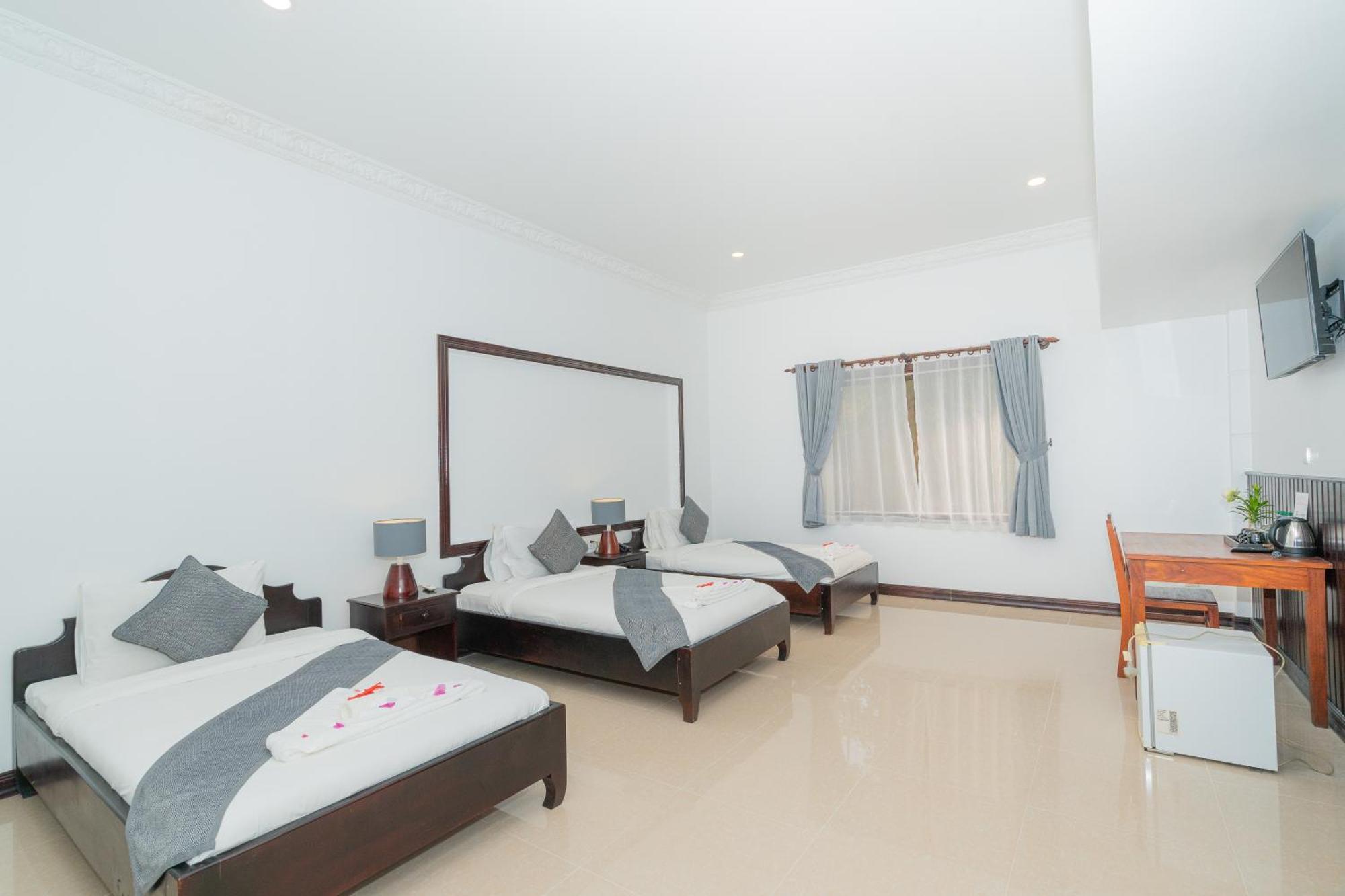 Deluxe Triple Room