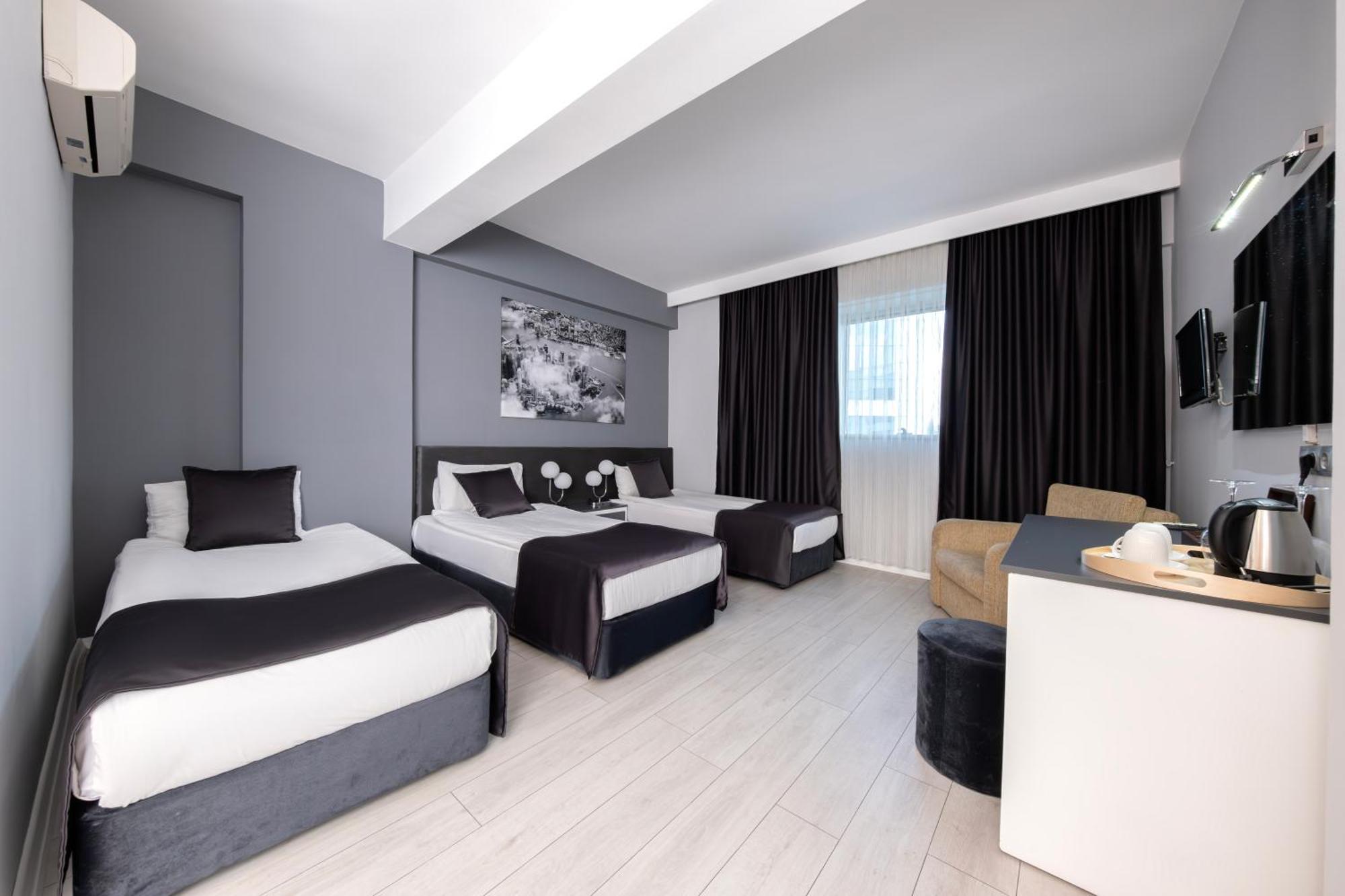 Deluxe Quadruple Room,1607276843:JPEG